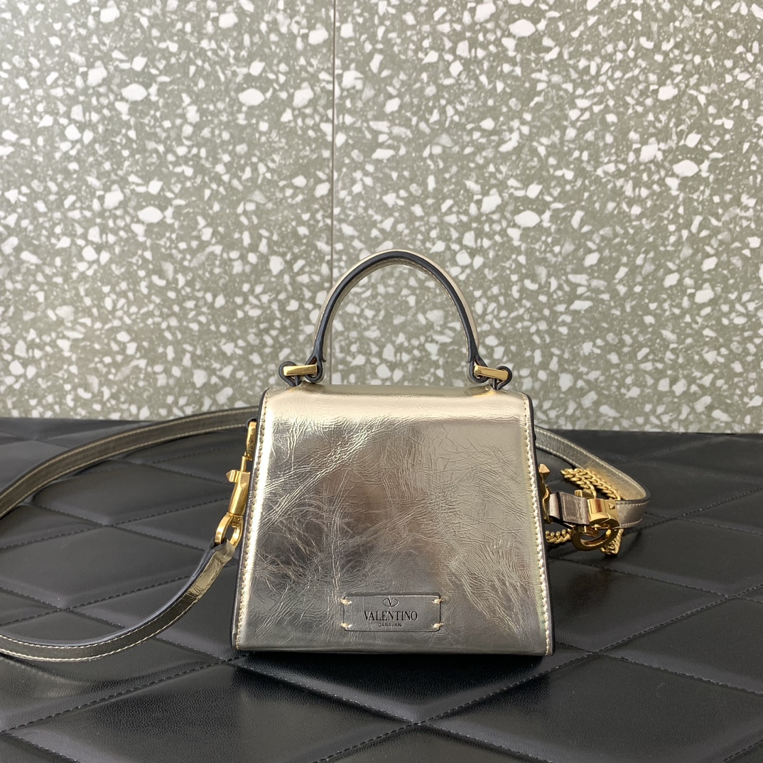 Valentino Garavani Vsling Micro Handbag in Gold Grainy Calfskin Leather 